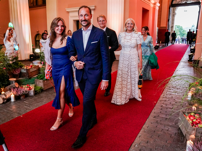 The Crown Prince with Princess Ingrid Alexandra followed by the Crown Princess and Prince Sverre Magnus as they arrive at the festivities. Photo: Stian Lysberg Solum / NTB